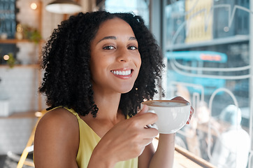 Image showing Happy black woman, portrait and relax in coffee shop, restaurant or bistro for lunch, latte and easy lifestyle. Face, cafe and female enjoy cup of drink, cappuccino and break alone with happiness