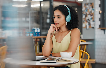 Image showing Video call, laptop and black woman in coffee shop for meeting, virtual conference and networking. Communication, cafe and girl with headphones on computer for webinar, freelance and remote work