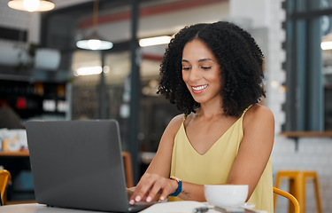 Image showing Black woman, laptop and remote work in cafe for planning freelance research in restaurant. Happy female, coffee shop and computer email technology on internet, blogging and social networking online