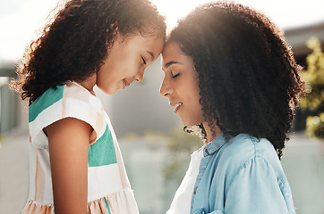 Image showing Love, forehead and mother with daughter, outdoor and happiness on break, bonding and loving. Mama, female child and faces together with smile, quality time and kid with mom, relax and summer holiday