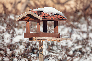 Image showing birdhouse in winter garden