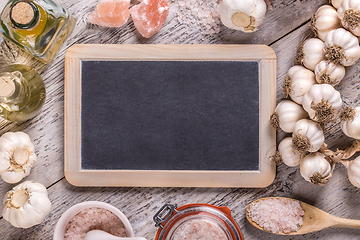 Image showing Blackboard and garlic