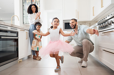 Image showing Dance, princess and family with children in home kitchen for love, care and fun bonding together, clapping or celebration. Support, dancing and Mexico girl or kid with parents or mother and father