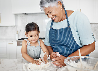 Image showing Love, grandmother and girl baking, learning and happiness on weekend, break and teaching skills. Female kid, old woman or granny with granddaughter in kitchen, dough or bonding with child development