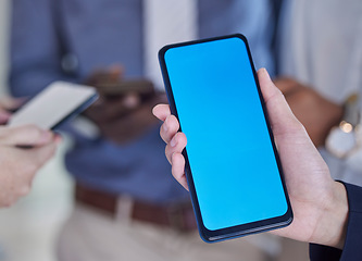 Image showing Green screen, phone and hands of business people for mobile app, design mockup and product placement. Smartphone, technology and blue background for communication, networking chat or social media ux