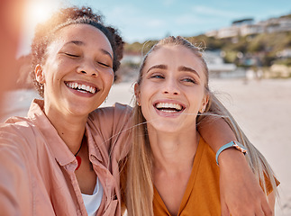 Image showing Selfie, funny and laughing friends at the beach for bonding, weekend and holiday in Miami. Happy, comic and women with a photo for vacation memory, travel and happiness hug by the sea in summer