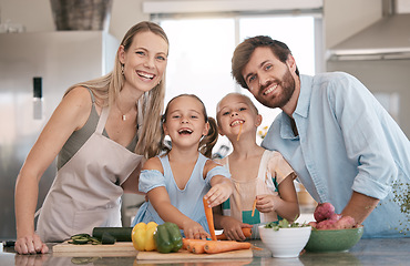 Image showing Portrait of mom, dad and children cooking in kitchen with vegetables for lunch, food or meal prep together. Family, smile and parents with girls learning, teaching and helping for child development