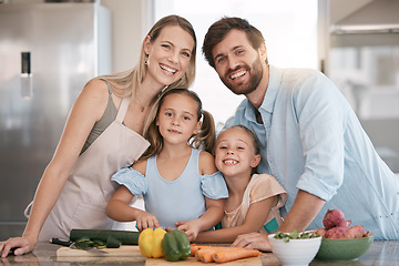 Image showing Kitchen, cooking and portrait of parents and children with vegetables for healthy diet, food or meal prep together. Family, smile and mom, dad and girls learning, teaching and helping cut ingredients