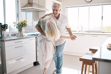 Image showing Senior couple dancing, kitchen and happiness with love, care and support in morning at house. Elderly man, old woman and dance together with smile, hands and support in retirement in home with trust