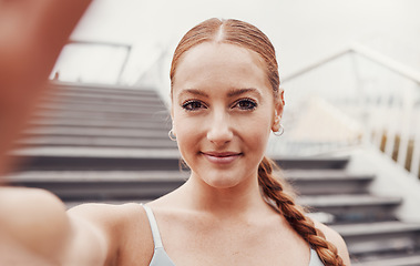 Image showing Selfie, fitness and woman portrait by outdoor stairs ready for running, exercise and workout. Happy, influencer and smile of a young person runner on the internet or web with sport wellness