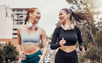 Image showing Fitness, city and friends running together for a wellness, health and endurance exercise. Sports, healthy athletes and happy women runners doing a cardio workout for sport training in a town.