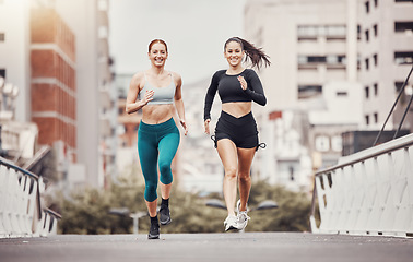 Image showing Women are running in city, fitness and cardio outdoor, exercise friends and active lifestyle together. Sport, health and training, runner on urban bridge with healthy people in California and mockup