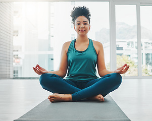 Image showing Black woman, yoga portrait and meditation with lotus exercise for fitness, peace and wellness. Young person in health studio for holistic workout, mental health and body balance with zen energy