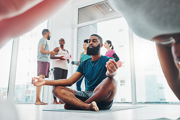 Image showing Yoga, meditation and black man do lotus exercise for fitness, peace and wellness in class. Young sports person in health studio for holistic workout, mental health and body balance with zen energy