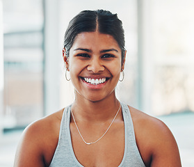 Image showing Fitness, happy and portrait of a woman in the gym after a workout for health and wellness. Happiness, smile and headshot of a female model athlete standing in a sport center for exercise or training.