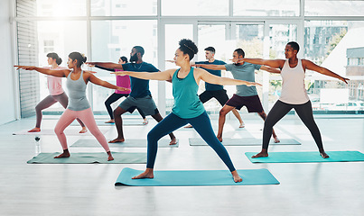 Image showing Yoga instructor, exercise class and fitness people in warrior ir stretching for health and wellness. Diversity men and women group together for workout, training or pilates for healthy lifestyle