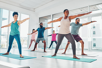 Image showing Yoga class, exercise and fitness people in warrior or stretching for health and wellness. Diversity men and women group together in pilates studio for holistic workout or body balance with zen energy