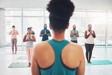 Image showing Yoga class, instructor and meditation exercise with fitness people prayer hands for health and wellness. Diversity men and women in pilates studio for holistic workout or body balance with zen energy