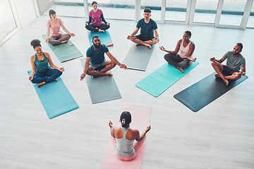 Image showing Yoga class, exercise and meditation with people for fitness, health and wellness above. Diversity men and women in health studio for lotus workout, mental health and body balance with zen coach