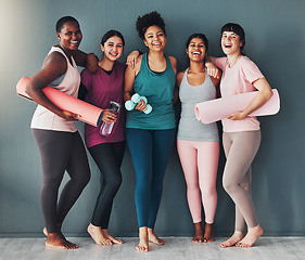 Image showing Portrait, wall and women exercise, friends and training together, bonding and motivation for workout. Fitness females and ladies with yoga mat, water bottle or ready for practice, sports or body care