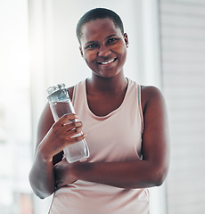 Image showing Portrait, black woman and exercise with water bottle, smile and training for wellness, balance or healthy lifestyle. Face, African American female athlete or lady with liquid, happiness and hydration