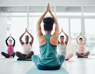 Image showing Diversity women, yoga class and meditation exercise for fitness, peace and wellness. Instructor with group in health studio for holistic workout, mental health and body balance with zen prayer hands