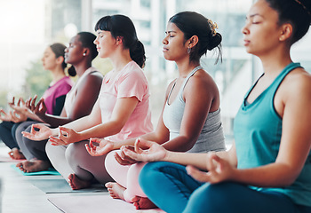 Image showing Meditation exercise, yoga class and healthy women together for fitness, peace and wellness. Diversity group in lotus at health studio for holistic workout, mental health and body balance for zen mind