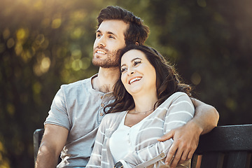 Image showing Love, couple and hug on park bench, laughing at funny joke or comic comedy and having fun together outdoors. Valentines day, romance relax and man and woman thinking and embrace on romantic date.