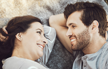 Image showing Love, couple romance and relax, talking and having fun time together outdoors on valentines day. Trust, support and face of happy man and woman lying on romantic date, smile and having conversation.