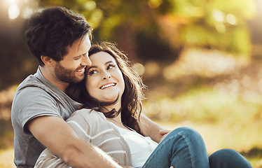 Image showing Love, couple and relax at park, laughing at funny joke or comic comedy and having fun time together outdoors. Valentines day, romance hug and care of happy man and woman sitting on romantic date.