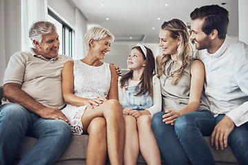 Image showing Big family, love and relax on sofa in home living room, bonding or enjoying quality time together. Communication, care and happy grandparents, father and mother talking to girl, child or kid in house