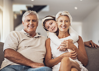 Image showing Love, portrait or grandparents hug a girl in living room bonding as a happy family in Australia with care. Retirement, smile or elderly man relaxing old woman with child at home together on holiday