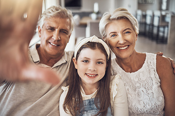 Image showing Selfie, portrait or happy grandparents with girl in living room bonding as a family in Australia with love. Pictures, smile or elderly man relaxing old woman with child at home together on holiday