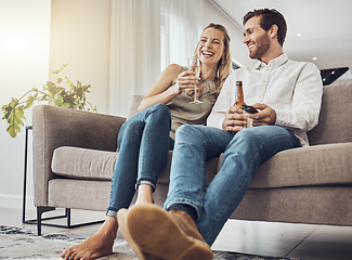 Image showing Love, couple on sofa and alcohol to relax, smile and bonding on weekend break, loving and romantic. Romance, man and woman with beer, champagne and celebrate achievement, happiness and in living room