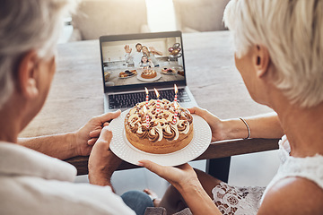 Image showing Birthday, cake and couple on video call on laptop for party, celebration or event in home. Big family, senior or man and woman holding food while talking to people on computer in online conference.