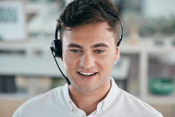 Image showing Call center, man and customer service consultant with a smile and headphones for contact us or crm. Telemarketing, online support and sales person in office for communication and help desk headset