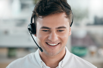 Image showing Man, customer service and call center consultant with a smile and headphones for contact us or crm. Telemarketing, online support and sales person in office for communication and help desk headset