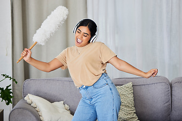 Image showing Music, dance and cleaning with a woman housekeeper in a home alone for hygiene while having fun. Radio, dancing and housekeeping with a female cleaner streaming or listening to audio in a living room