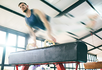 Image showing Fitness, gymnastics and balance beam with man for training, cardio and strength at gym. Athletic, male and acrobat practice speed, control and sport routine for muscle, power or endurance performance