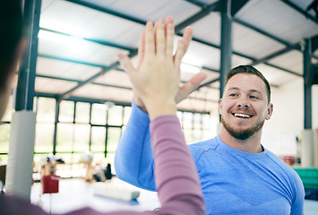 Image showing Man, exercise and high five in gym for achievement, target and celebration for fitness, workout and healthy lifestyle. Male, guy and athlete with hand gesture for support, teamwork and motivation