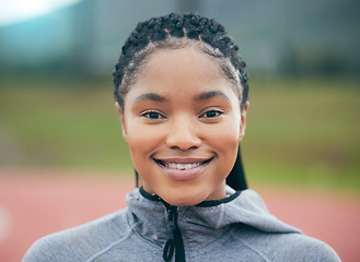 Image showing Fitness, portrait and black woman athlete with smile for workout, training or exercise goals outdoor in park. Face of a young african runner person with sports vision, mission and goals at stadium