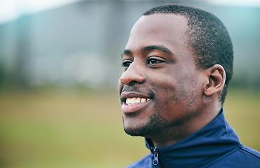 Image showing Happy, sports and coach by black man thinking on a field for fitness, exercise and training with mock up. Face, mindset and goals of a personal trainer outdoors for workout, performance and match