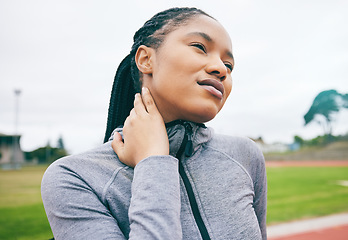 Image showing Fitness, neck pain and black woman with injury after running, workout or exercise. Winter sports, training and injured female athlete with inflammation, fibromyalgia and painful muscles outdoors.