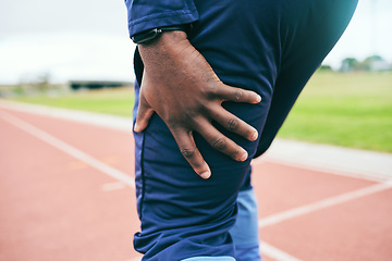 Image showing Leg pain, injury and black man runner, fitness and race in stadium, training for marathon or relay outdoor. Running, sports accident and inflammation, emergency with muscle tension and mockup space