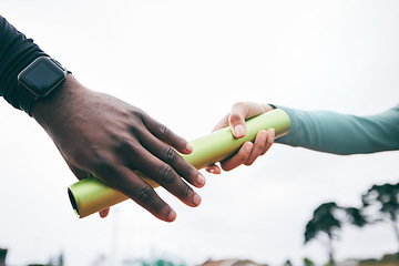 Image showing Closeup, hands and relay for competition, training and fitness for wellness, healthy lifestyle and exercise. Zoom, hand and teamwork for marathon, baton and running match for sports race or endurance