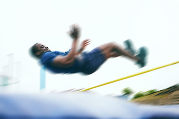 Image showing Athletics, fitness and high jump by man at a stadium for training, energy and cardio with blur and speed. Jumping, athlete and male outdoors for performance, endurance and competition on mock up