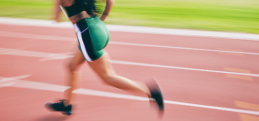 Image showing Black woman, running and legs in athletics for sports training, cross fit or exercise on stadium track outdoors. African American female runner athlete in fitness, sport or run for practice workout