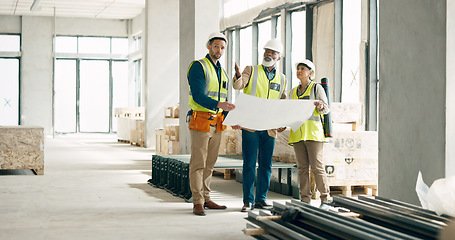 Image showing Architect, construction and team planning with blueprint for building project, strategy and collaboration on site. Group of people in engineering and architecture in business discussion for design