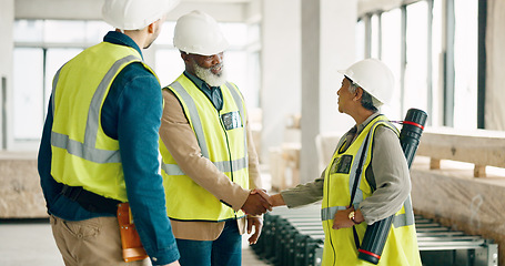 Image showing Handshake, architecture and engineering team shaking hands with a project development designer in a building. Global, b2b and happy construction workers in meeting or partnership deal with contractor