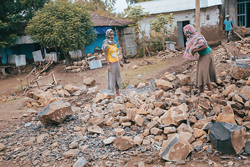 Image showing Ethiopian mans resting behind house